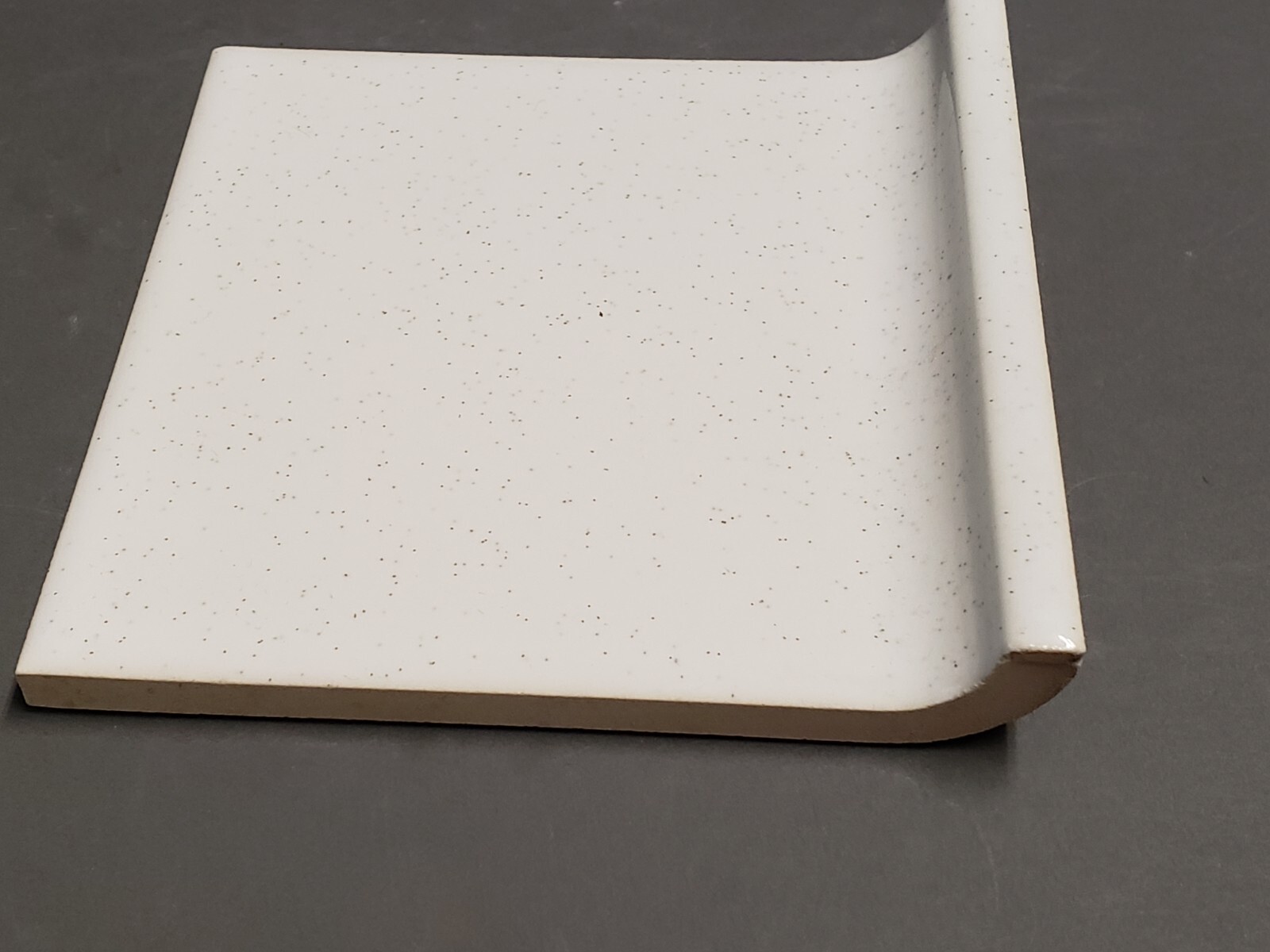 Vtg. 1960s Tilecrest Ceramic Cove Edge Tile 4 1/4″ White Black specks Glossy NEW