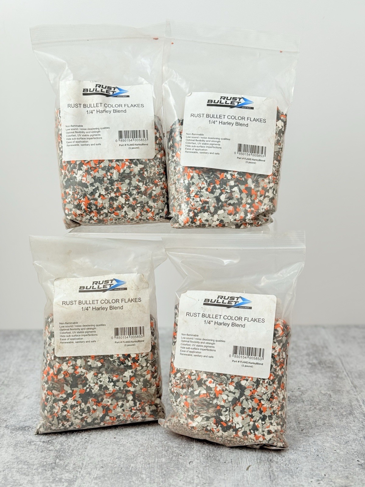 Rust Bullet Color Flake 1/4” Harley Blend Customized Concrete Floor Black Orange