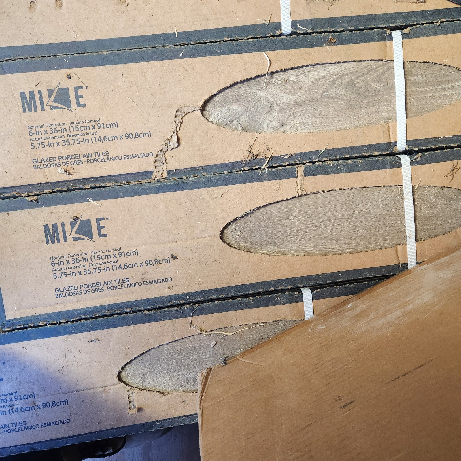 MIZLE Glazed Porcelain Floor Tile 6-in x 36-in Brown Wood Look for Floor & Wall