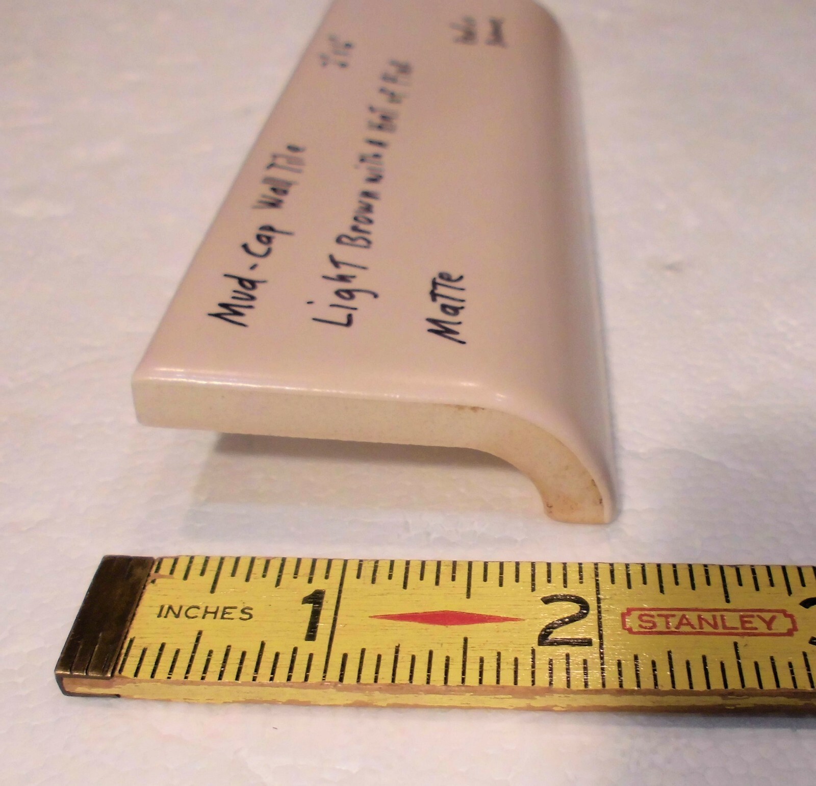 1 pc. Lite Brown+hint of pink: 2″ X 6″ X 5/8″ Matte Ceramic Radius Bullnose Tile