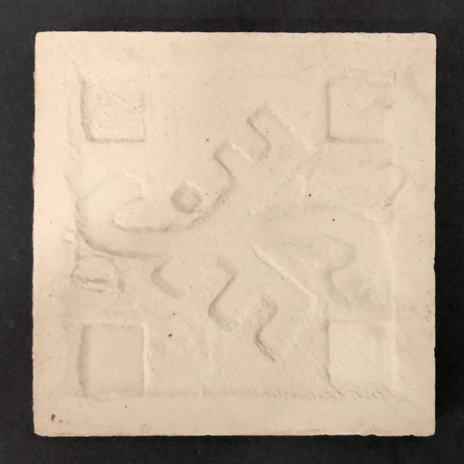 Off White Field Tile 4″ with Aztec Symbol
