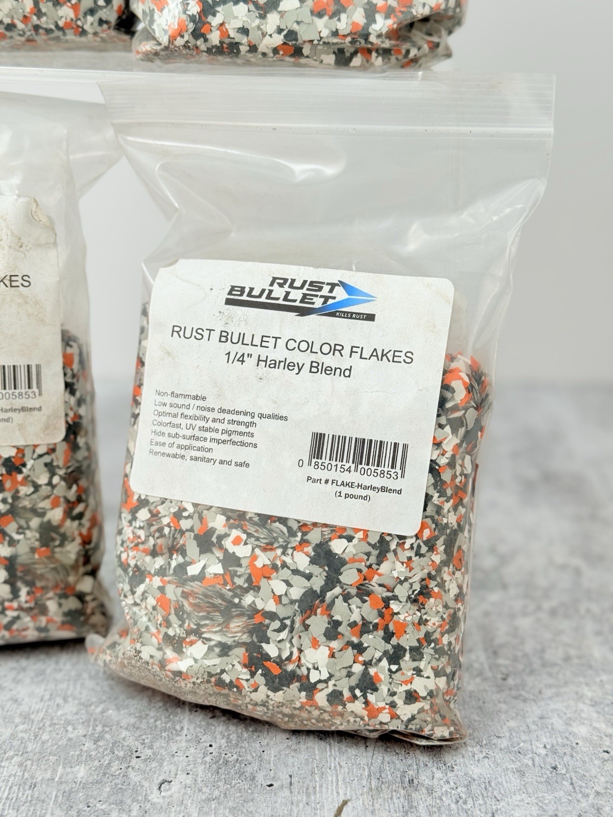 Rust Bullet Color Flake 1/4” Harley Blend Customized Concrete Floor Black Orange