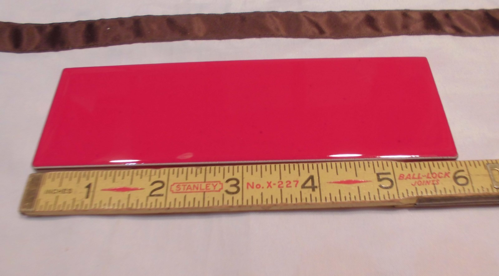 10 pcs. Glossy Ceramic Tiles *Liner/Sizzle *Ruby Red* by American Olean 2″ X 6″