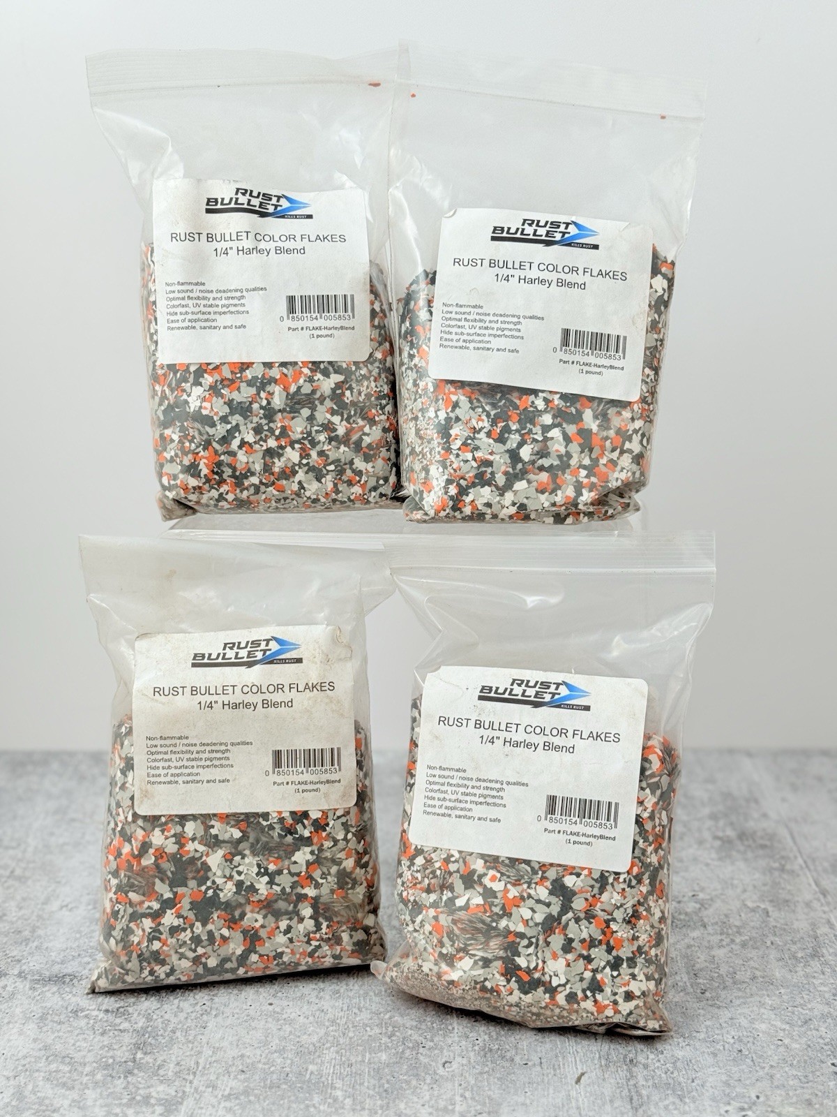 Rust Bullet Color Flake 1/4” Harley Blend Customized Concrete Floor Black Orange