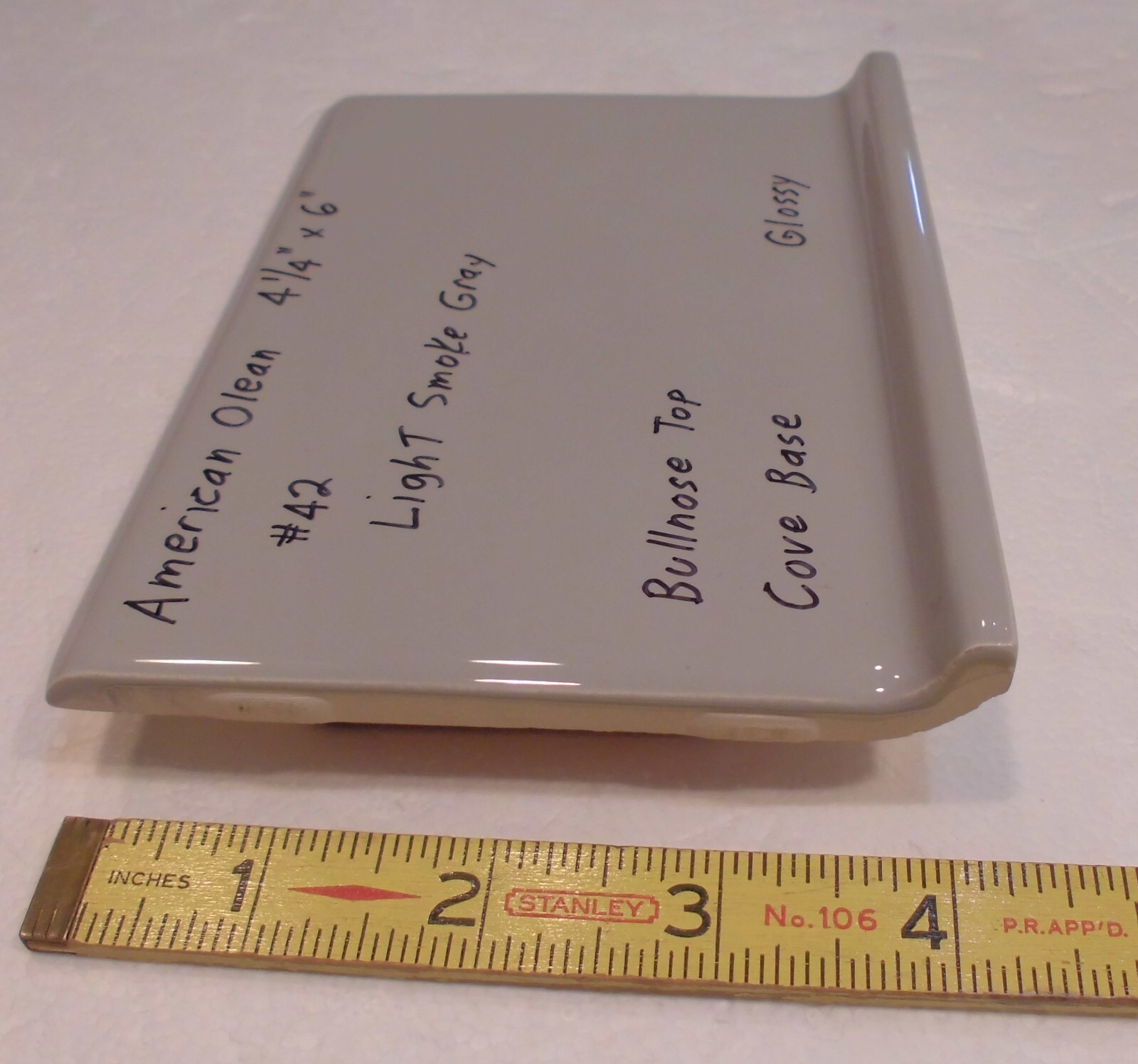 1 pc. Light Smoke Gray: base/cove Ceramic Glossy Tile: 4-1/4″ X 6″ Bullnose Top