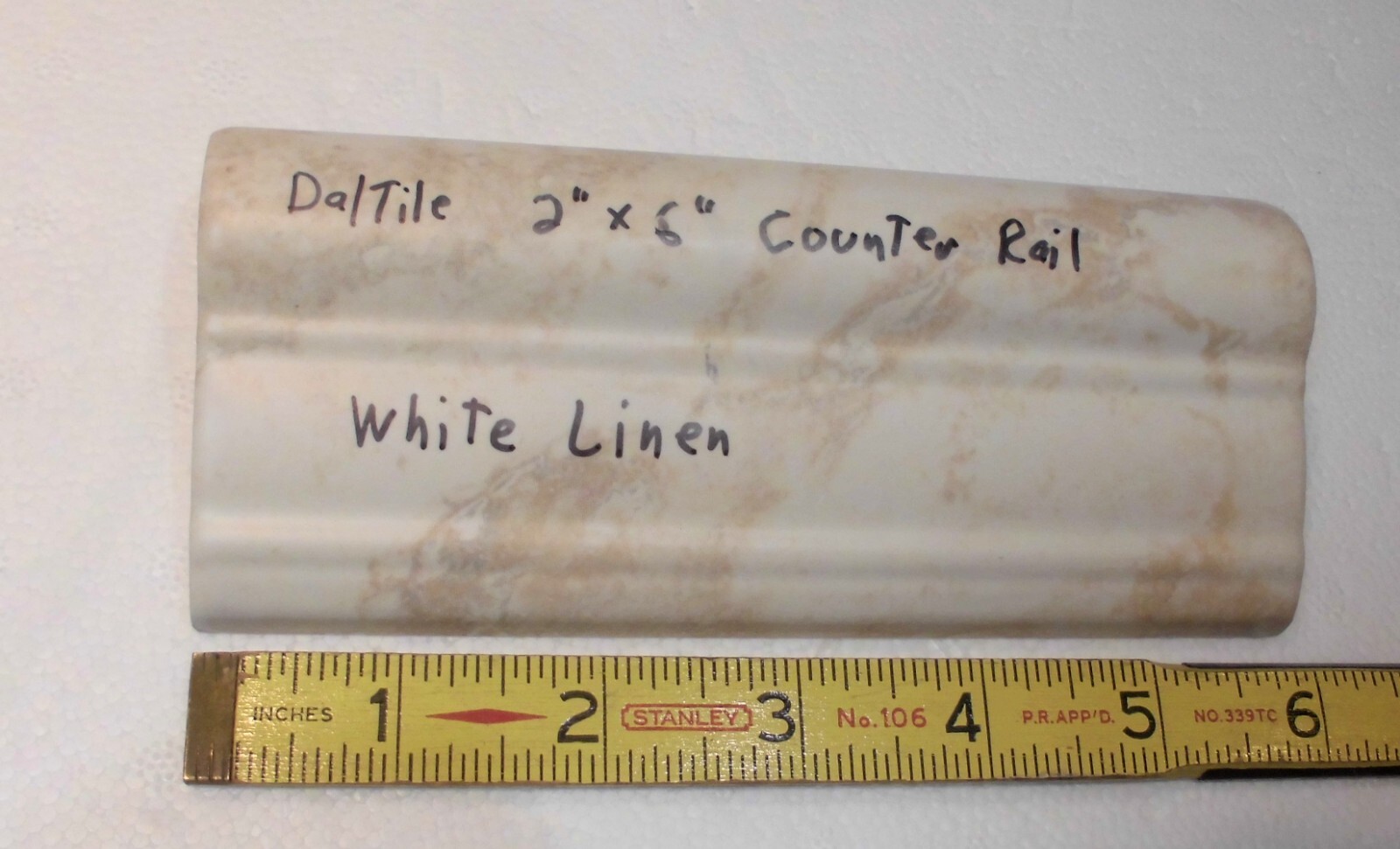 1 pc. Daltile: White Linen + Brown: V Cap Ceramic Trim Tile: Countertop-Edging