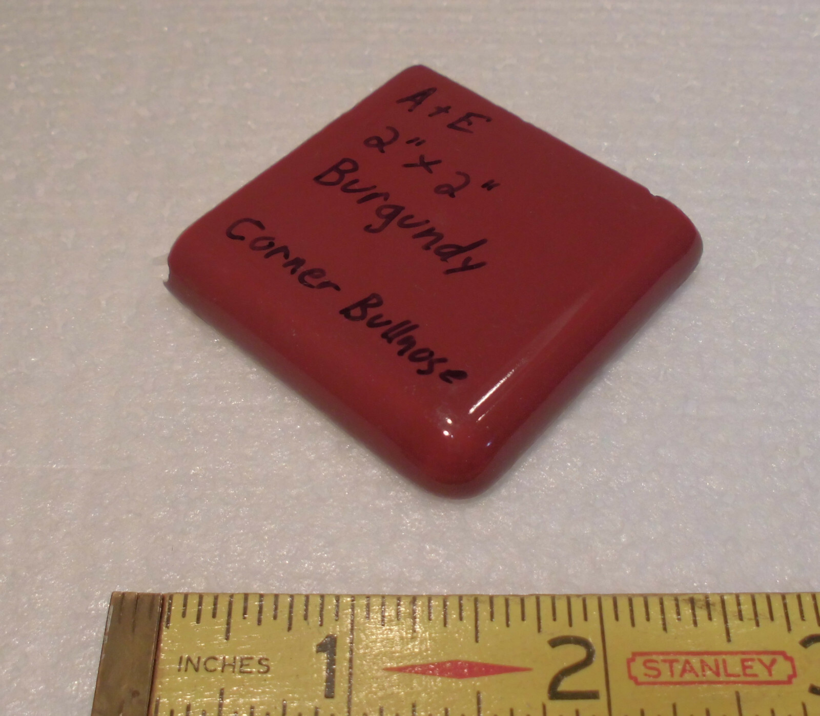 Burgundy 2″ X 2″ X 5/16″ Ceramic Surface Bullnose Corner Tile; made 1940’s
