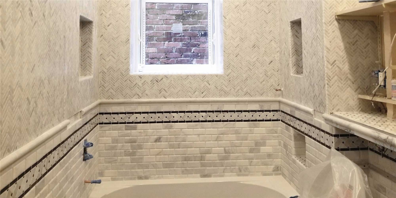 C651BXP Carrara Marble Basketweave Listello Border Black Dots Polished 4×12