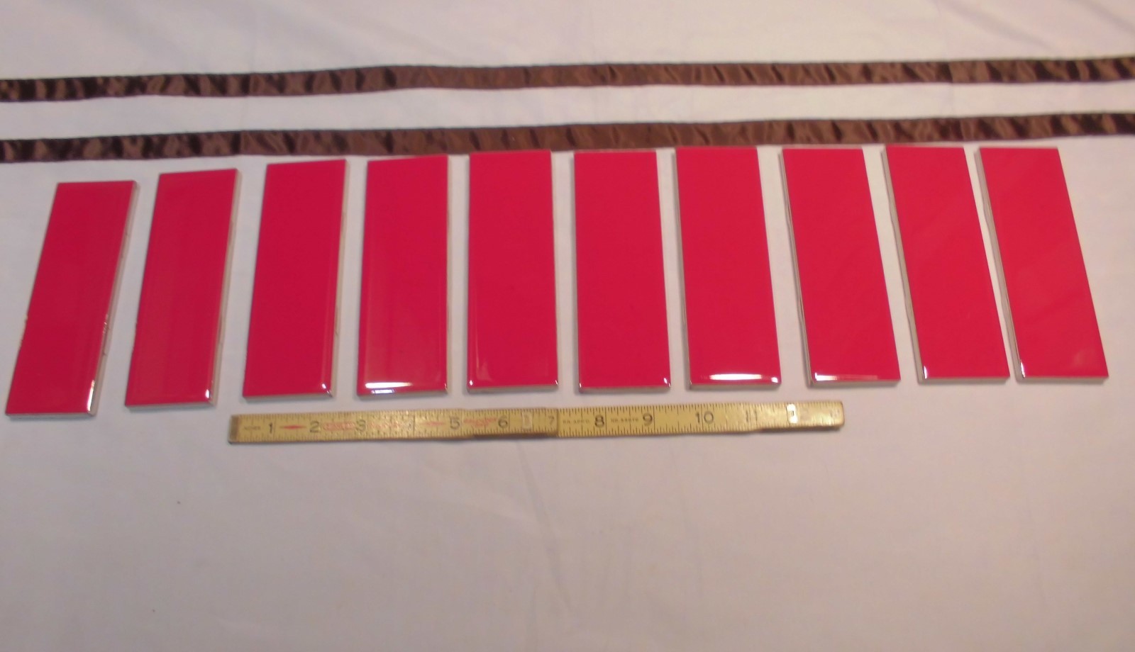 10 pcs. Glossy Ceramic Tiles *Liner/Sizzle *Ruby Red* by American Olean 2″ X 6″