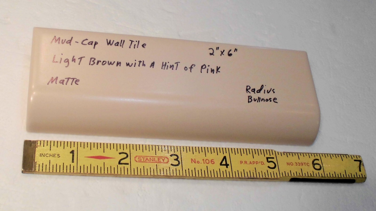 1 pc. Lite Brown+hint of pink: 2″ X 6″ X 5/8″ Matte Ceramic Radius Bullnose Tile