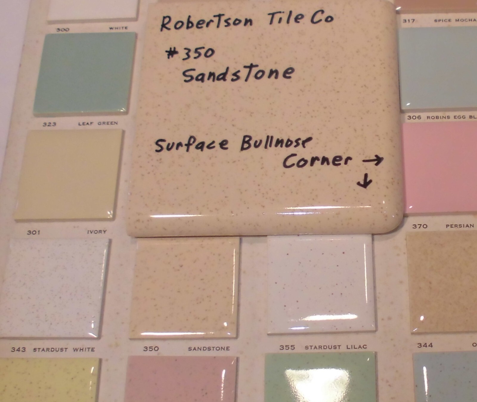 1 pc. Sandstone / Buckwheat: Glossy Ceramic Corner Bullnose Tile by Robertson Co