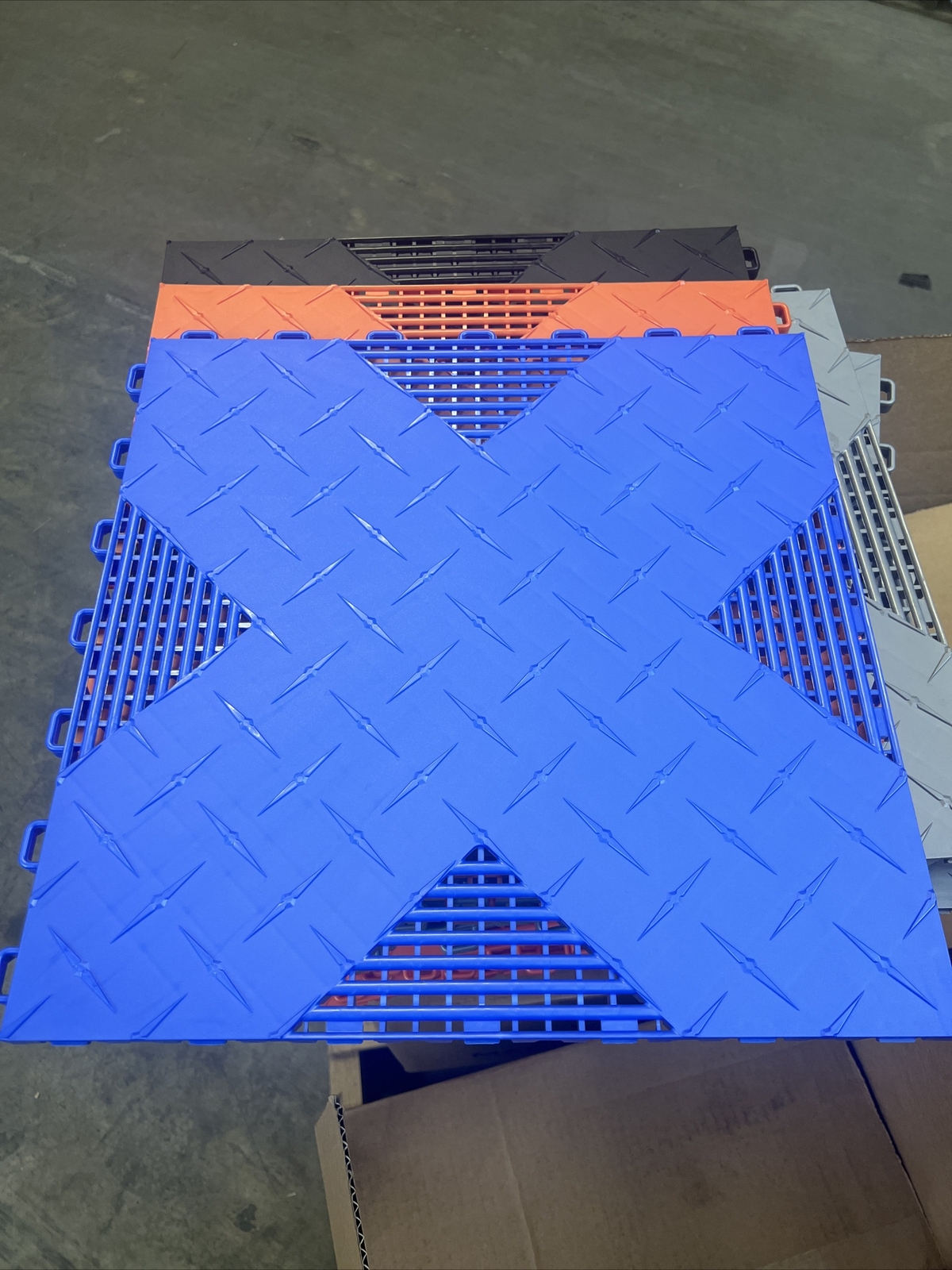 Blue … HYBRID-X garage floor tiles. 50 square feet 17” X 17” MADE IN USA