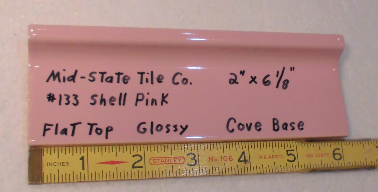 1 pc. Shell Pink 2” X 6-1/8” Glossy Ceramic Cove Base Tile, Flat Top, Mid-State