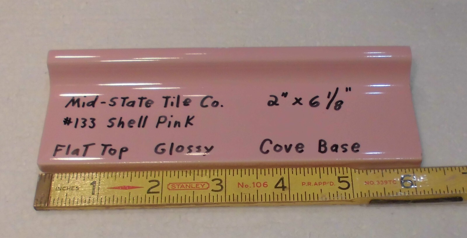 1 pc. Shell Pink 2” X 6-1/8” Glossy Ceramic Cove Base Tile, Flat Top, Mid-State