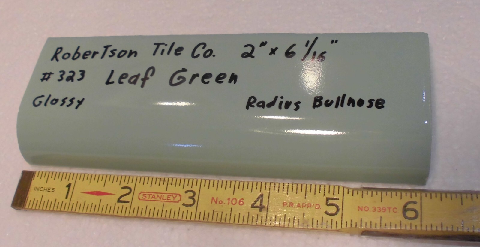 1 pc. Leaf Green: 2″ X 6-1/16″ Glossy Ceramic Radius Bullnose Tile: Mudd Caps,