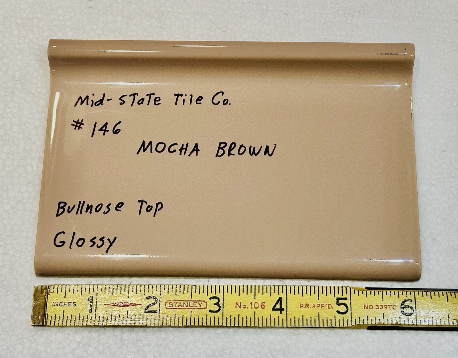 1 pc. Mocha/Brown Cove-Base Ceramic Tile 4″ X 6″ Mid-State, Glossy, Bullnose Top