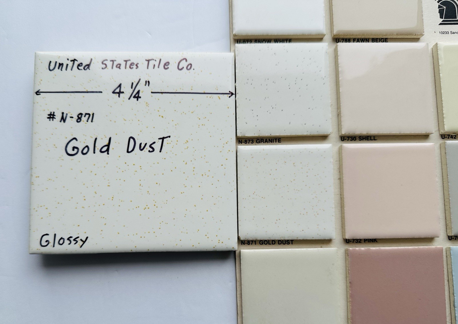 1 pc. Gold Dust: 4-1/4″ Gloss White Speckled Gold Ceramic United States Tile Co.