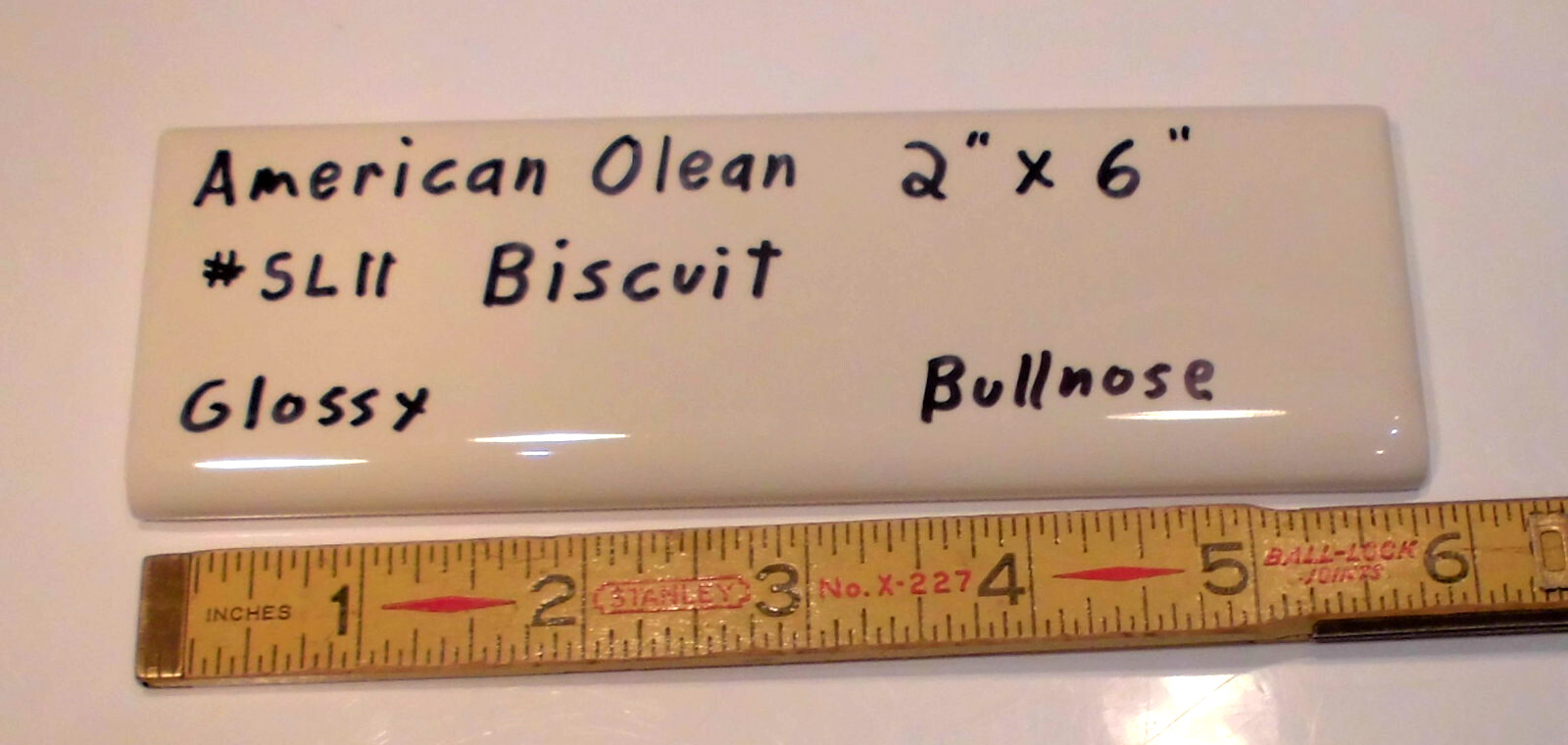 1 pc. Starting Line by American Olean; #SL11 Gloss Biscuit Bullnose Ceramic Tile