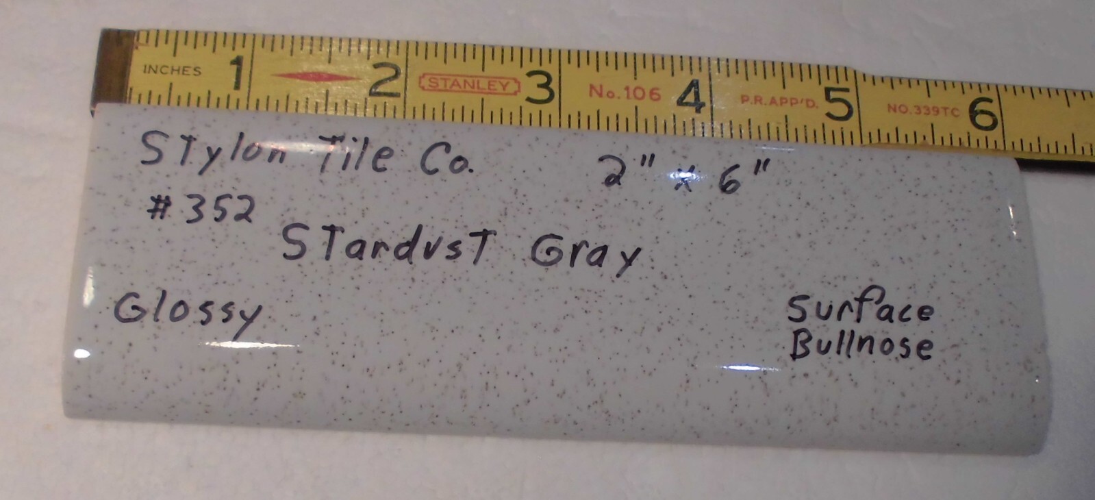 1 pc. Stardust Gray: 2” X 6” Speckled Glossy Bullnose Ceramic Tile, Stylon, Used