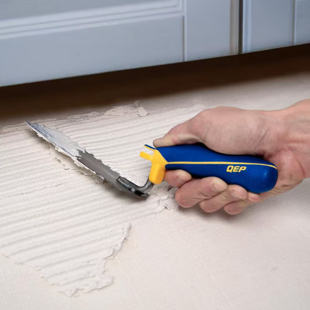 1/4 In. X 1/4 In. X 1/4 In. Comfort Grip Square-Notch Margin Flooring Trowel wit