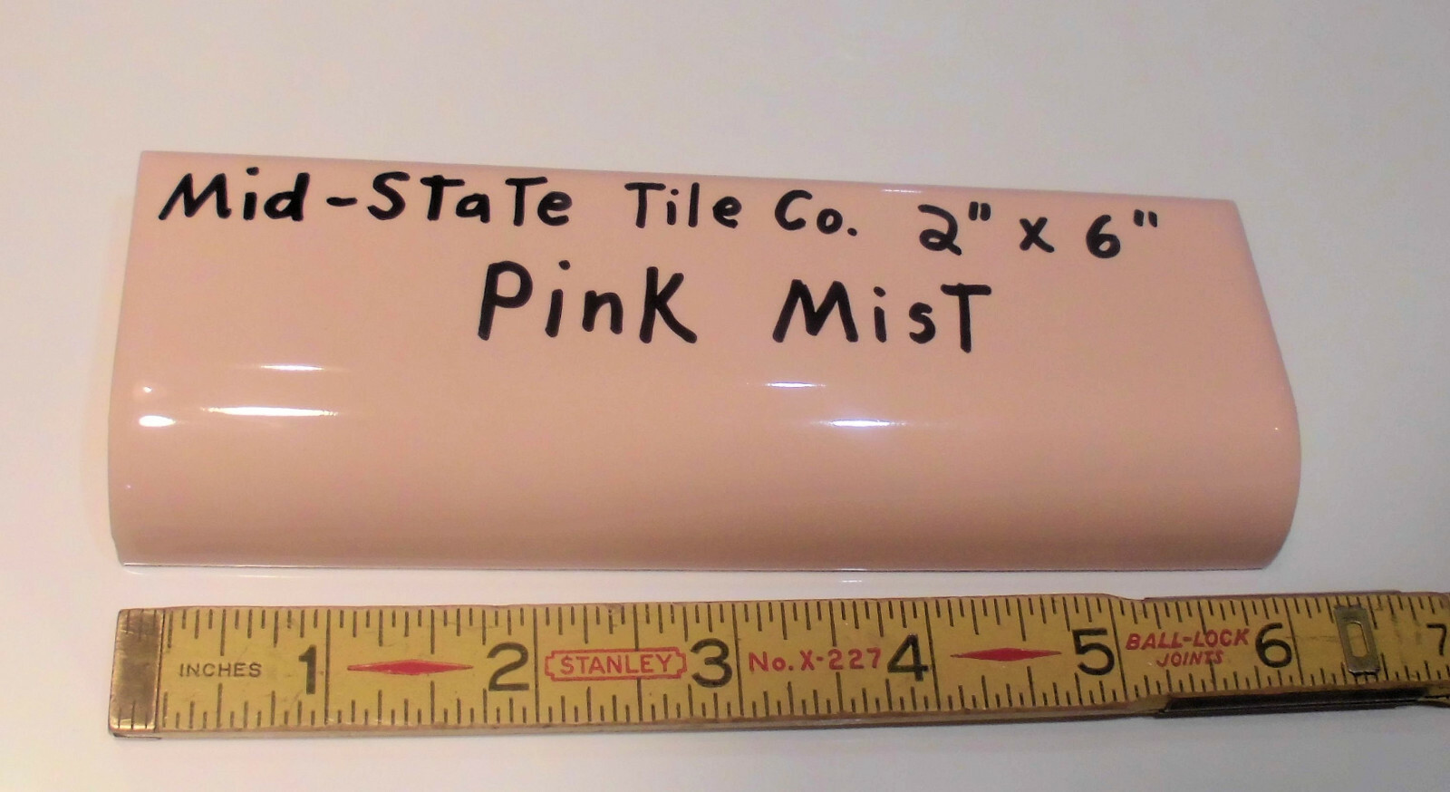1pc. *Peachy Pink Mist* Glossy Ceramic Radius Mud Cap Bullnose Tile; 2″ X 6″ NOS
