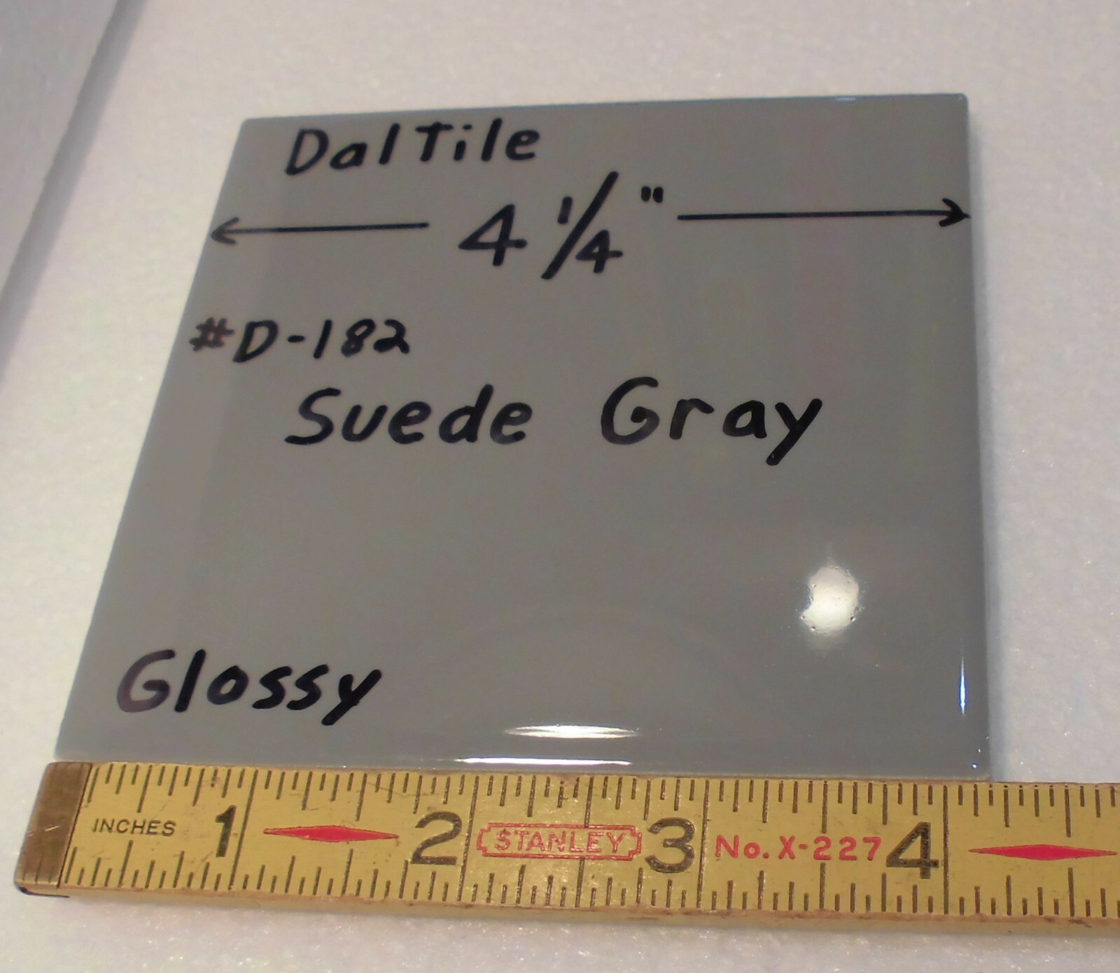 1 pc. Suede Gray; Glossy Ceramic Tile by Daltile; 4-1/4″ New Stock, darker gray