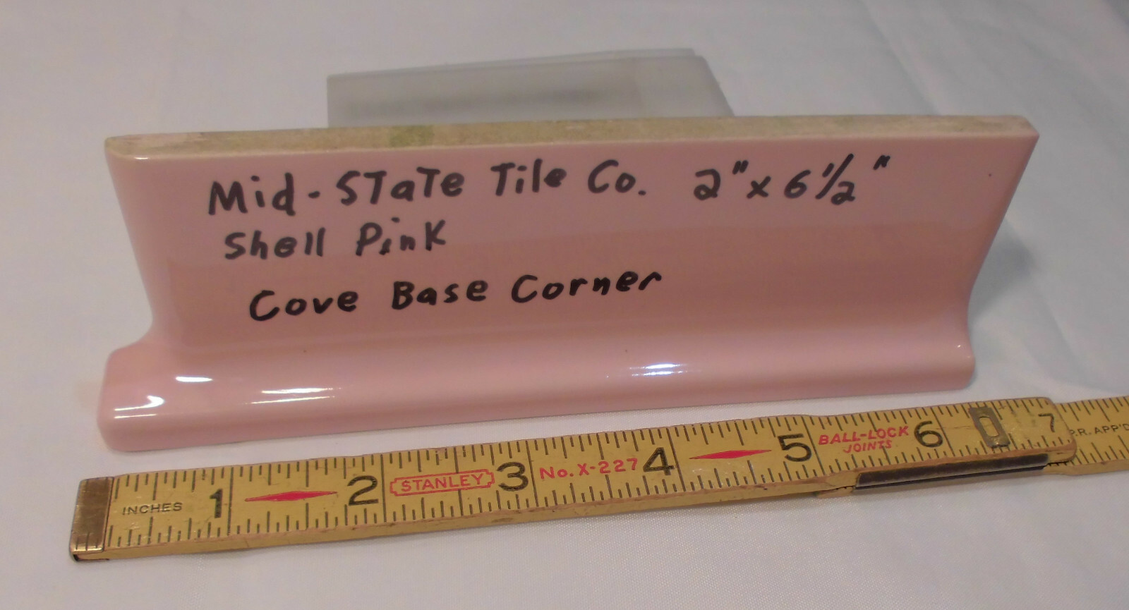 1 pc. Glossy Shell Pink 2” X 6-1/2” Ceramic Cove Base; Flat Tile; Flat Top, L