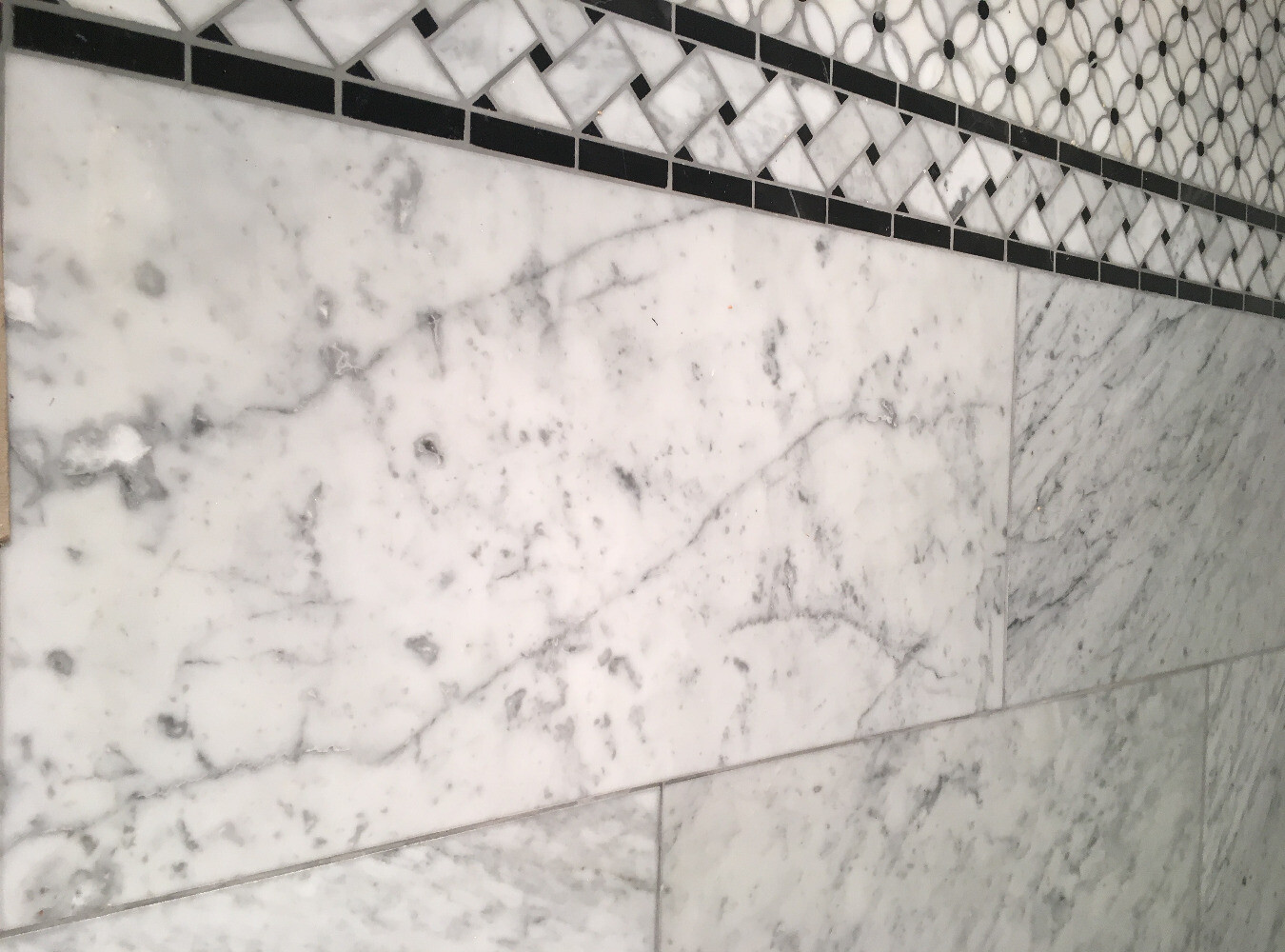C651BXP Carrara Marble Basketweave Listello Border Black Dots Polished 4×12