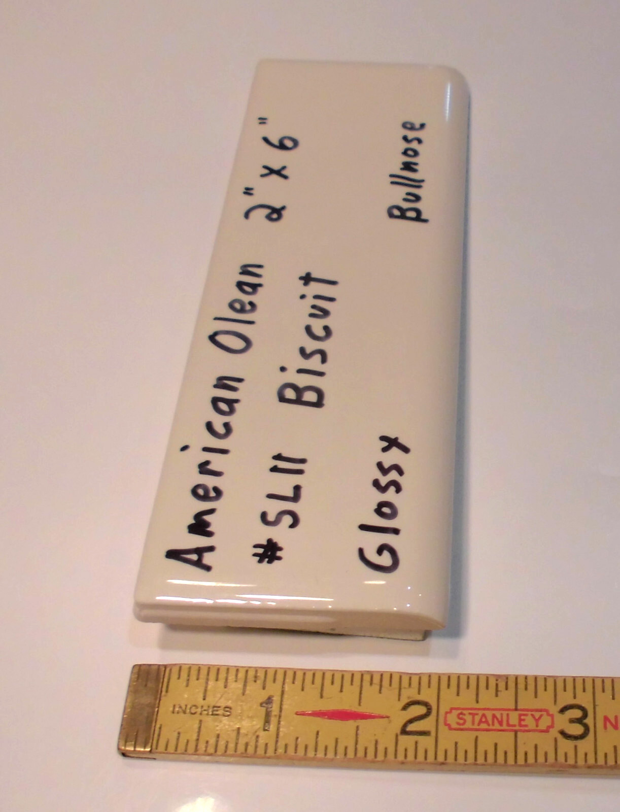 1 pc. Starting Line by American Olean; #SL11 Gloss Biscuit Bullnose Ceramic Tile