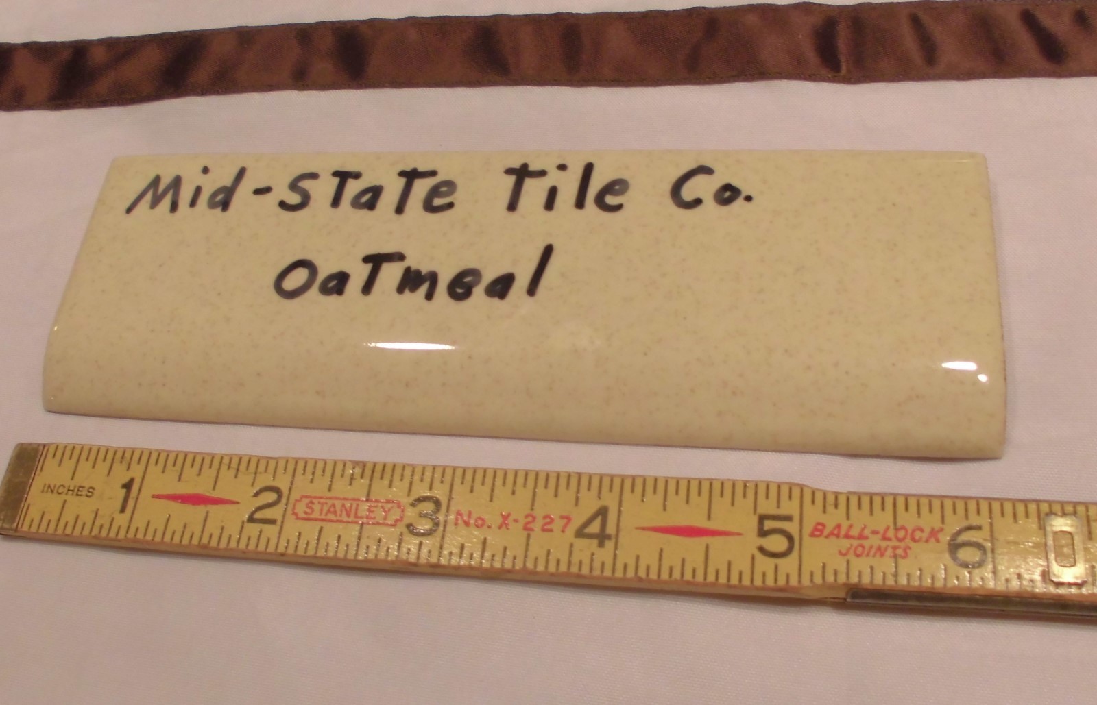 1 pc. Glossy *Oatmeal: 2” X 6-1/8” Bullnose Surface Ceramic Tile by MID-STATE