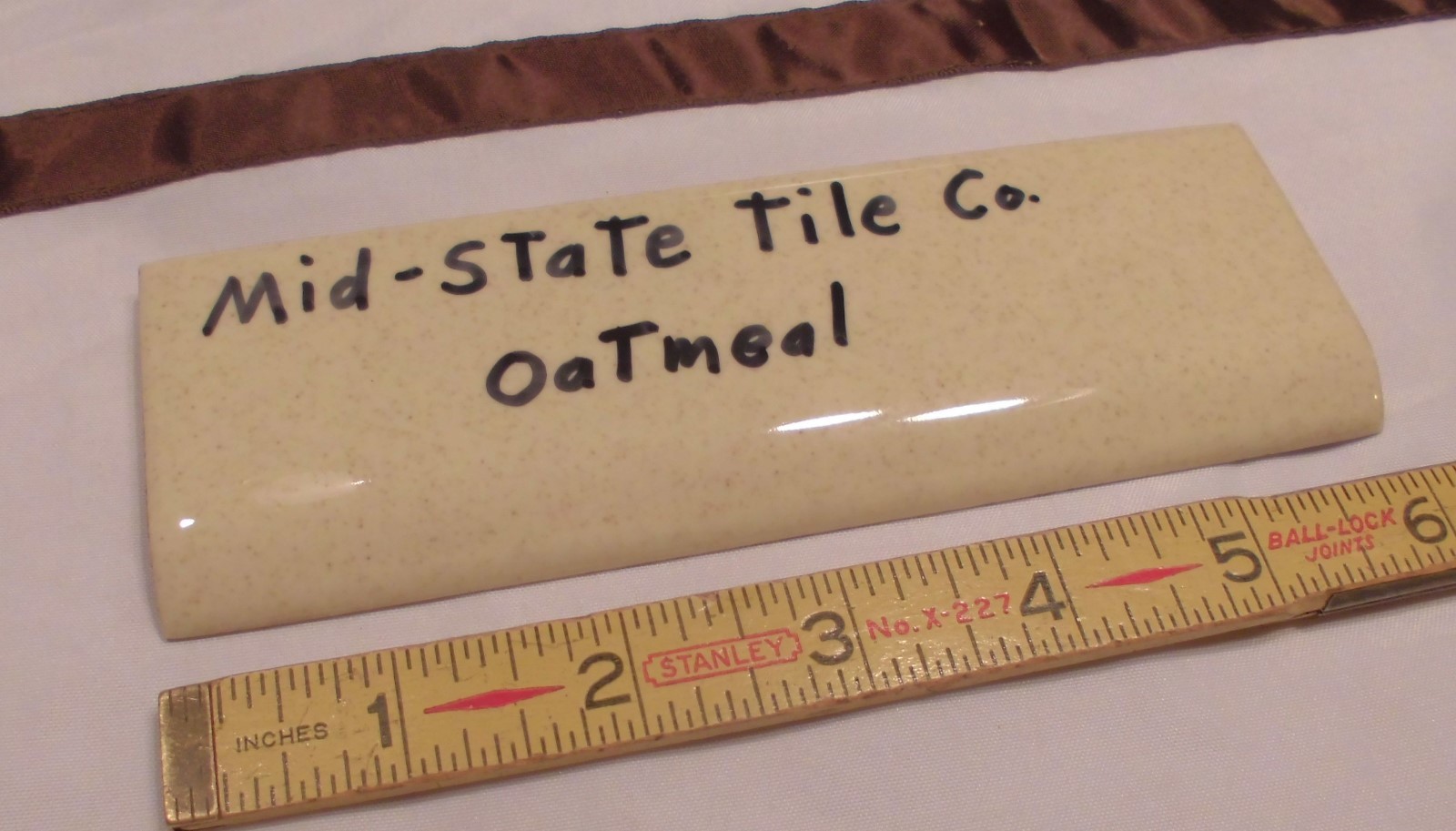 1 pc. Glossy *Oatmeal: 2” X 6-1/8” Bullnose Surface Ceramic Tile by MID-STATE