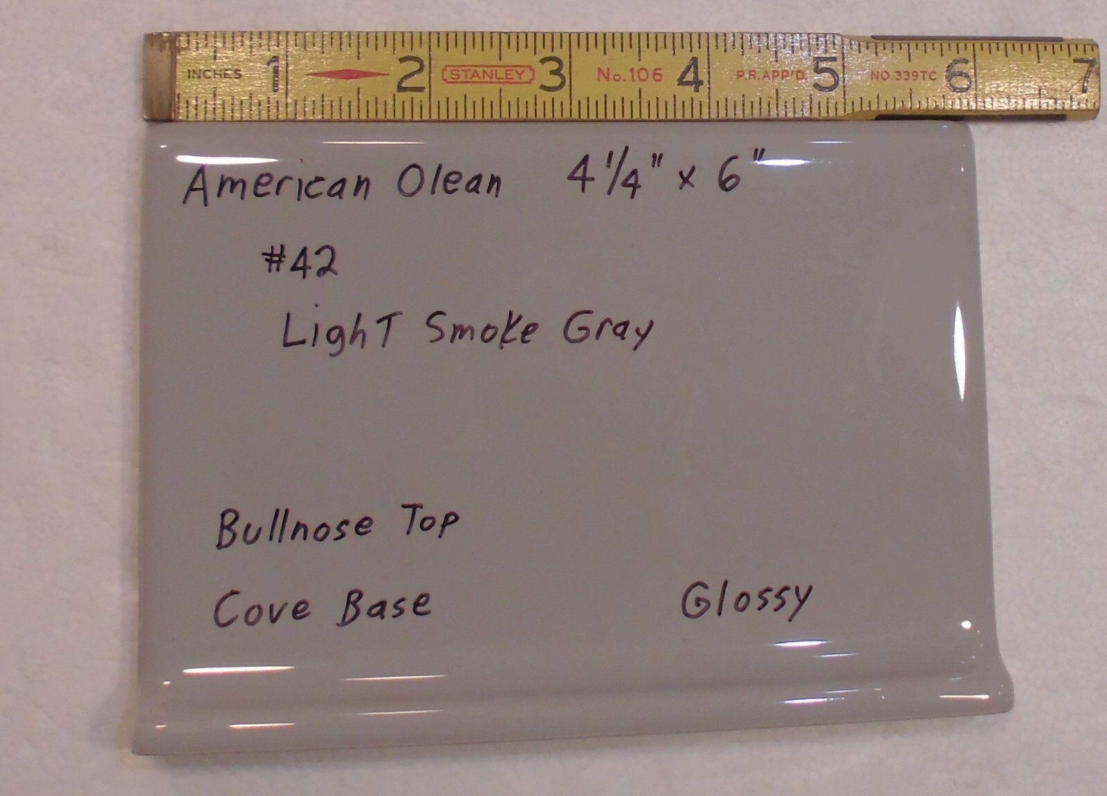 1 pc. Light Smoke Gray: base/cove Ceramic Glossy Tile: 4-1/4″ X 6″ Bullnose Top