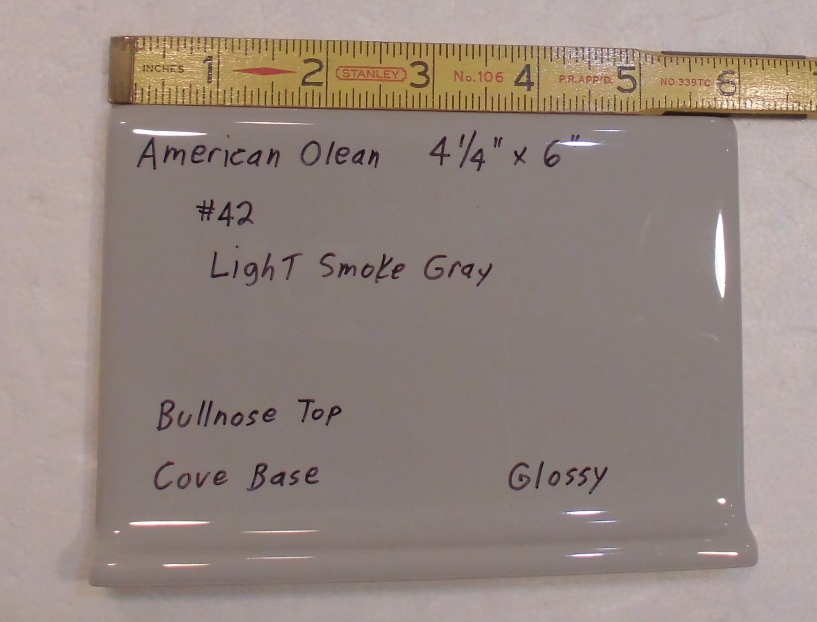 1 pc. Light Smoke Gray: base/cove Ceramic Glossy Tile: 4-1/4″ X 6″ Bullnose Top