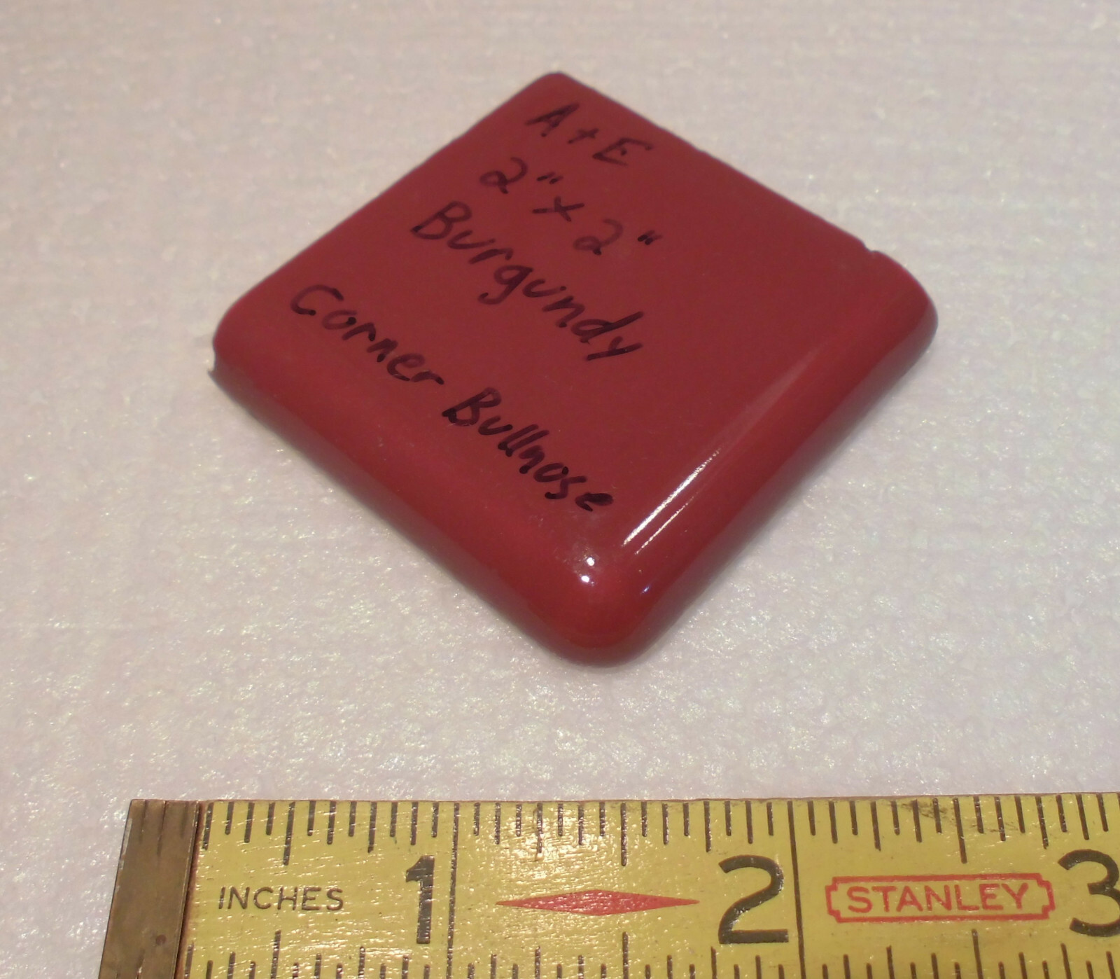 Burgundy 2″ X 2″ X 5/16″ Ceramic Surface Bullnose Corner Tile; made 1940’s