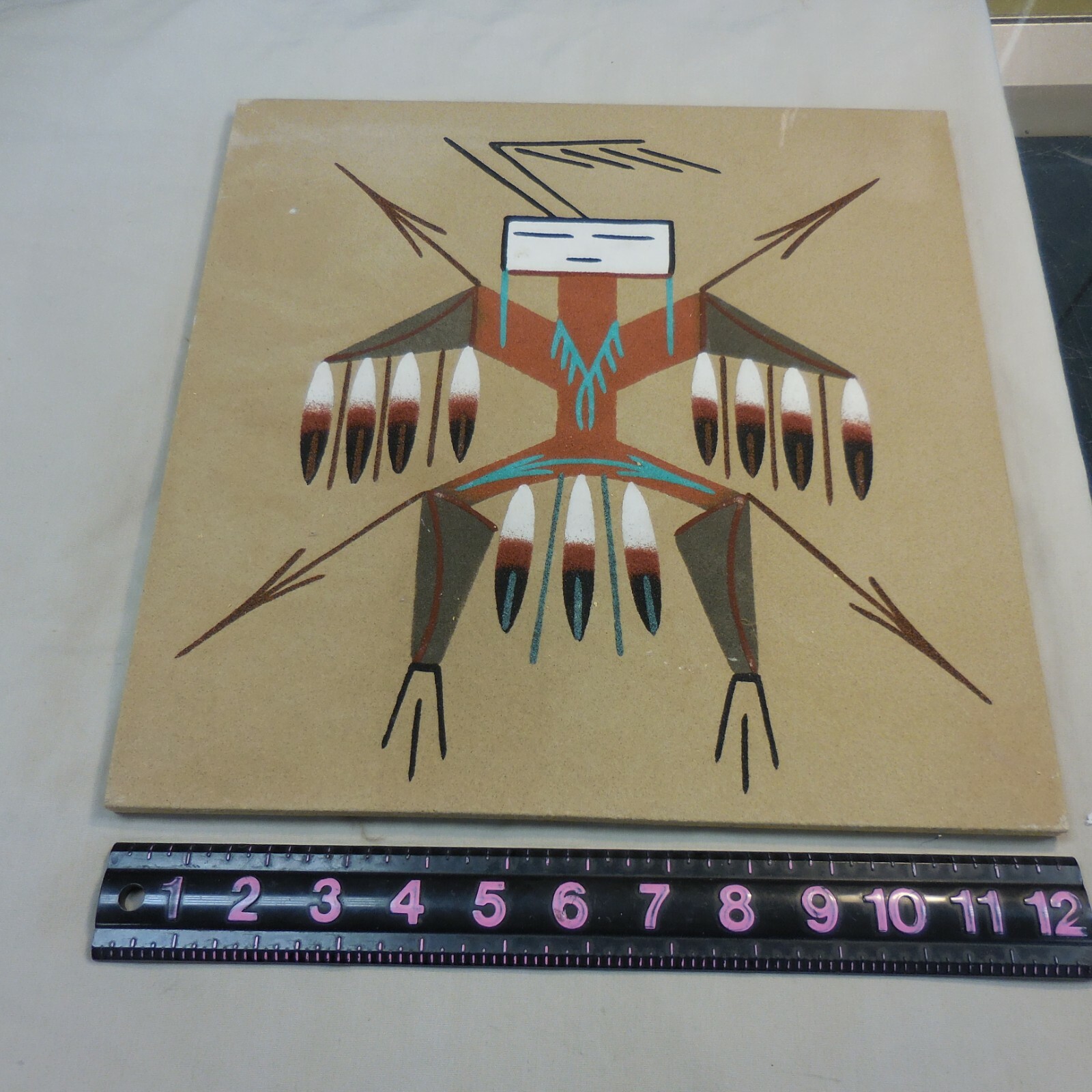 WOODEN BOARD WITH INDIAN PAINTED ARTWORK 12″ X 12″ –NOT SIGNED