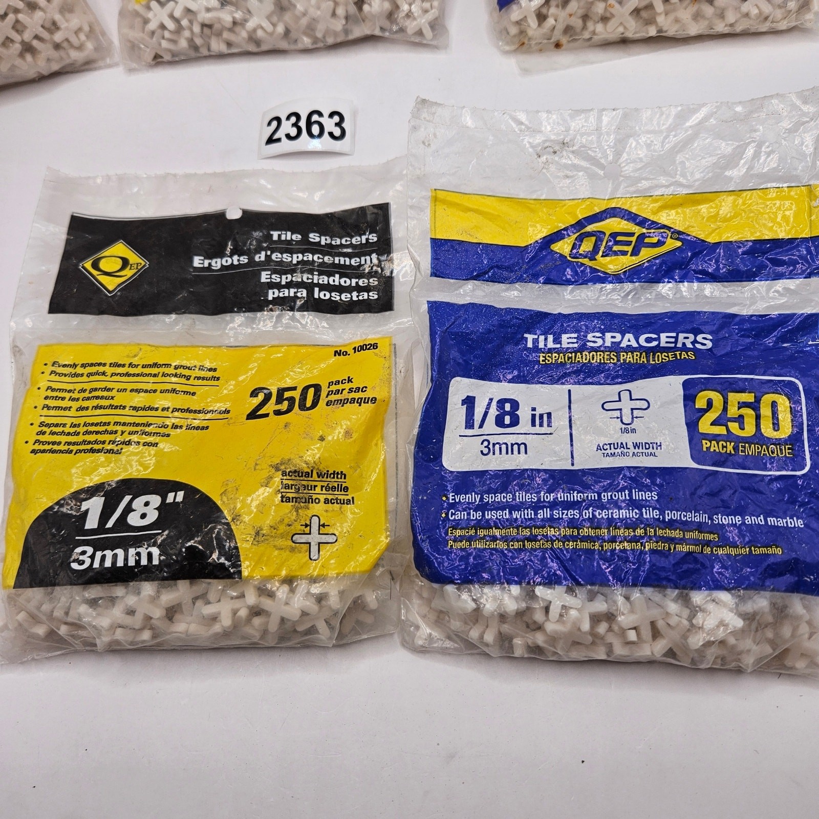 2300 COUNT LOT – QEB 1/8 IN TILE SPACERS NEW WITH 1 OPEN BAG CROSS FLEXIBLE