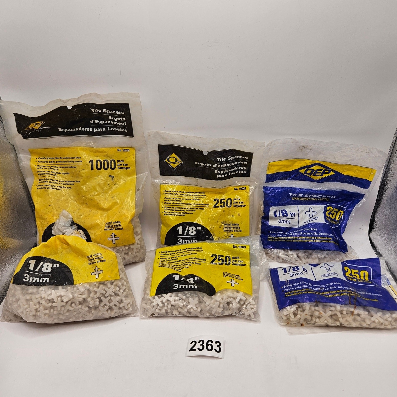 2300 COUNT LOT – QEB 1/8 IN TILE SPACERS NEW WITH 1 OPEN BAG CROSS FLEXIBLE