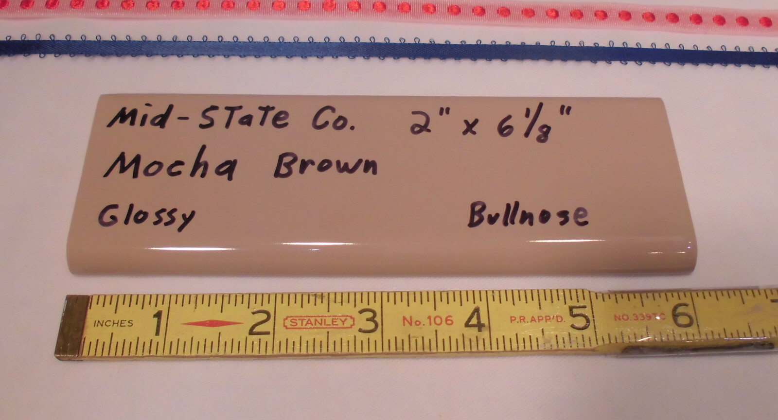 1 pc. Glossy *Mocha Brown* 2” X 6” Bullnose Surface Ceramic Tile by MID-STATE