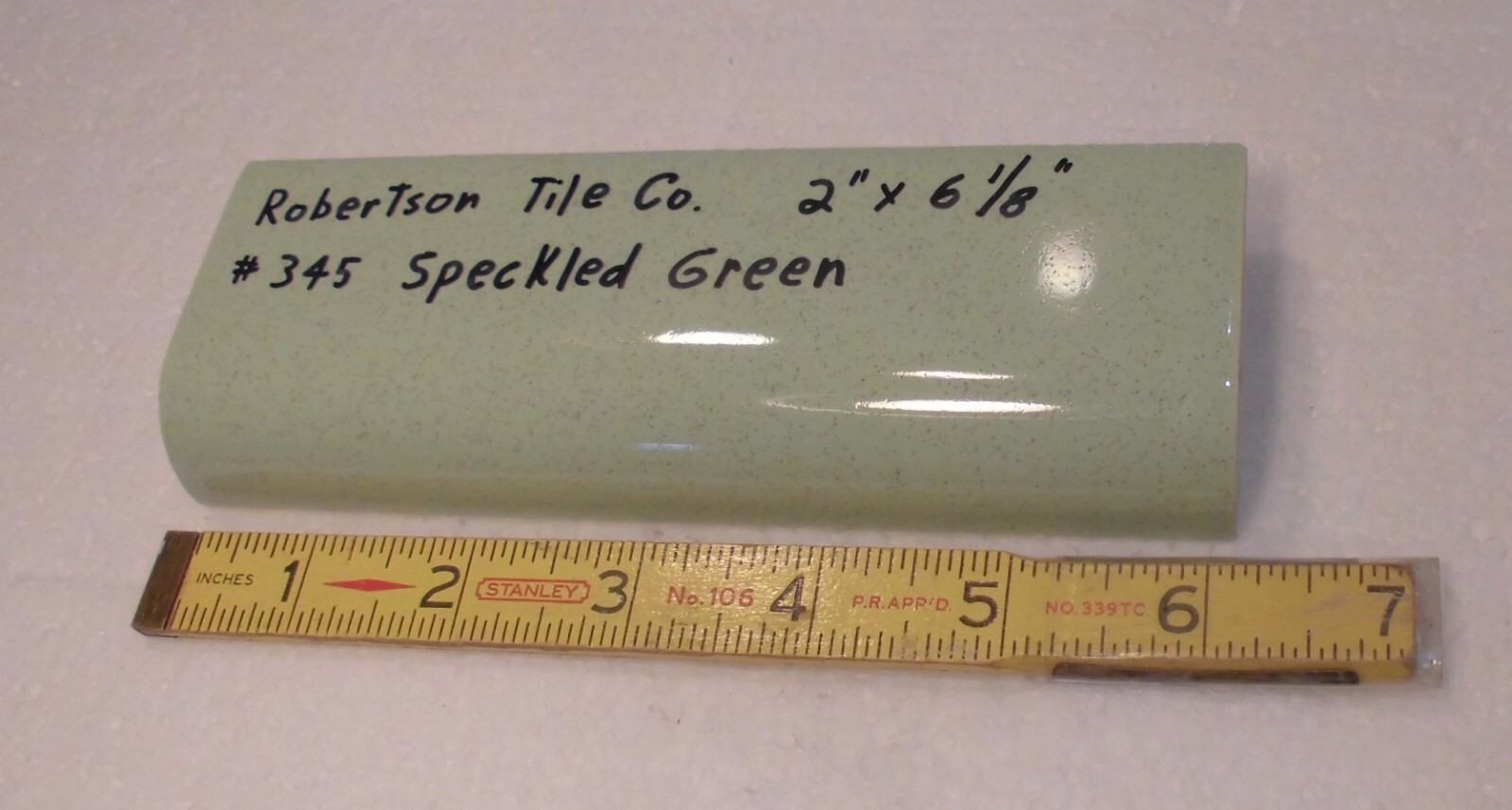 1 pc. Speckled Green: Ceramic Tile; 2″ X 6-1/8″ Radius Bullnose by Robertson Co.
