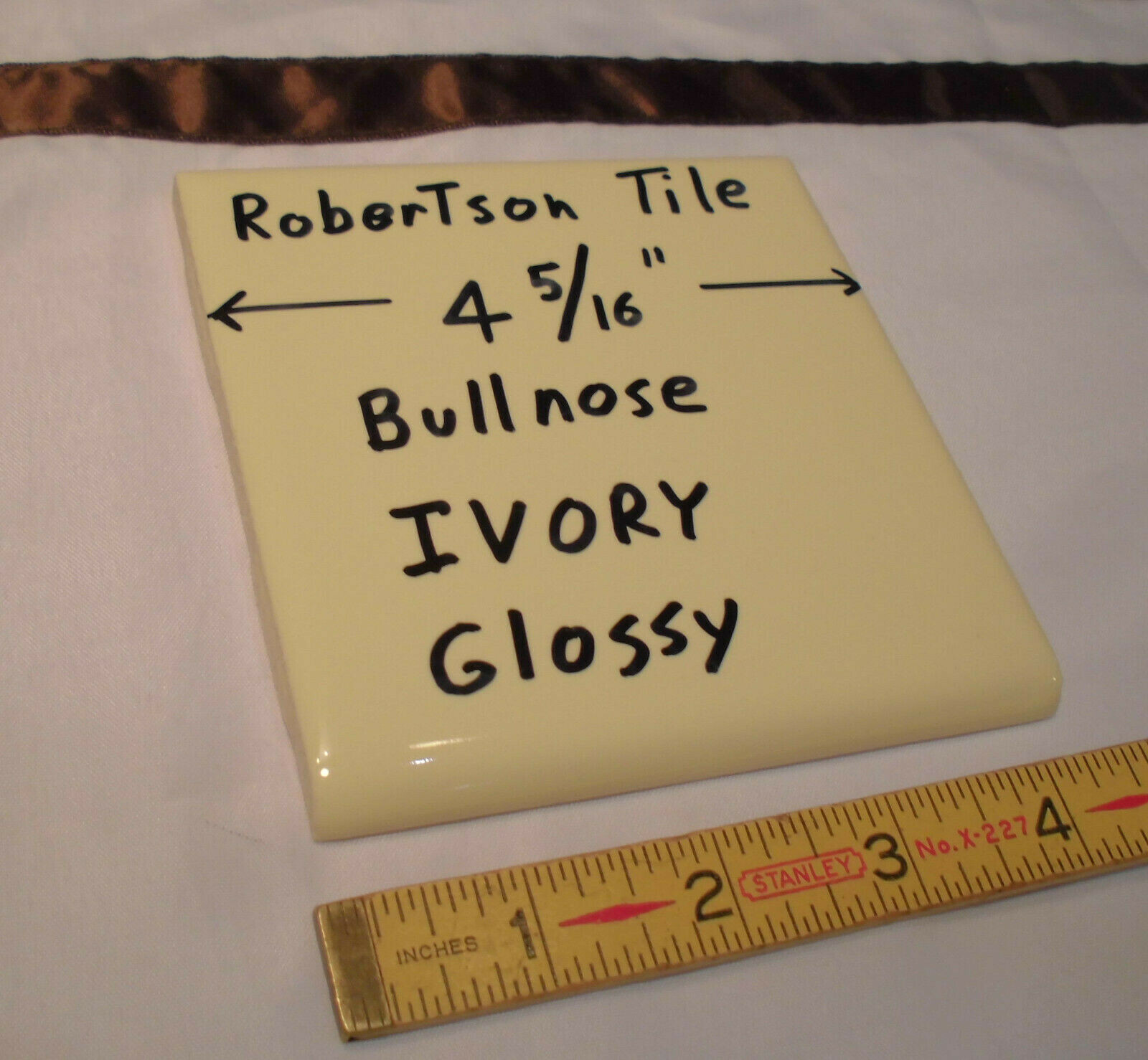 1 pc. Ivory- Light Yellow: 4-3/8″ Glossy Ceramic Bullnose by Robertson Tile Co.