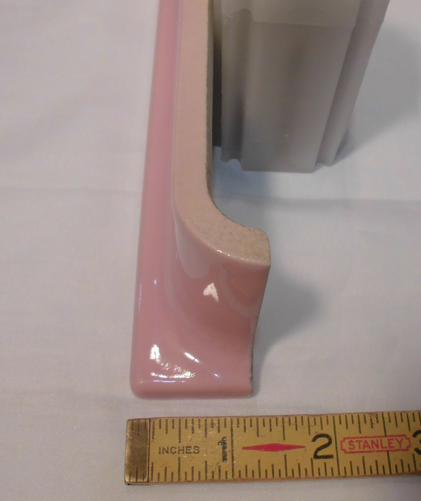 1 pc. Glossy Shell Pink 2” X 6-1/2” Ceramic Radius Cove Base Tile; Flat Top, R