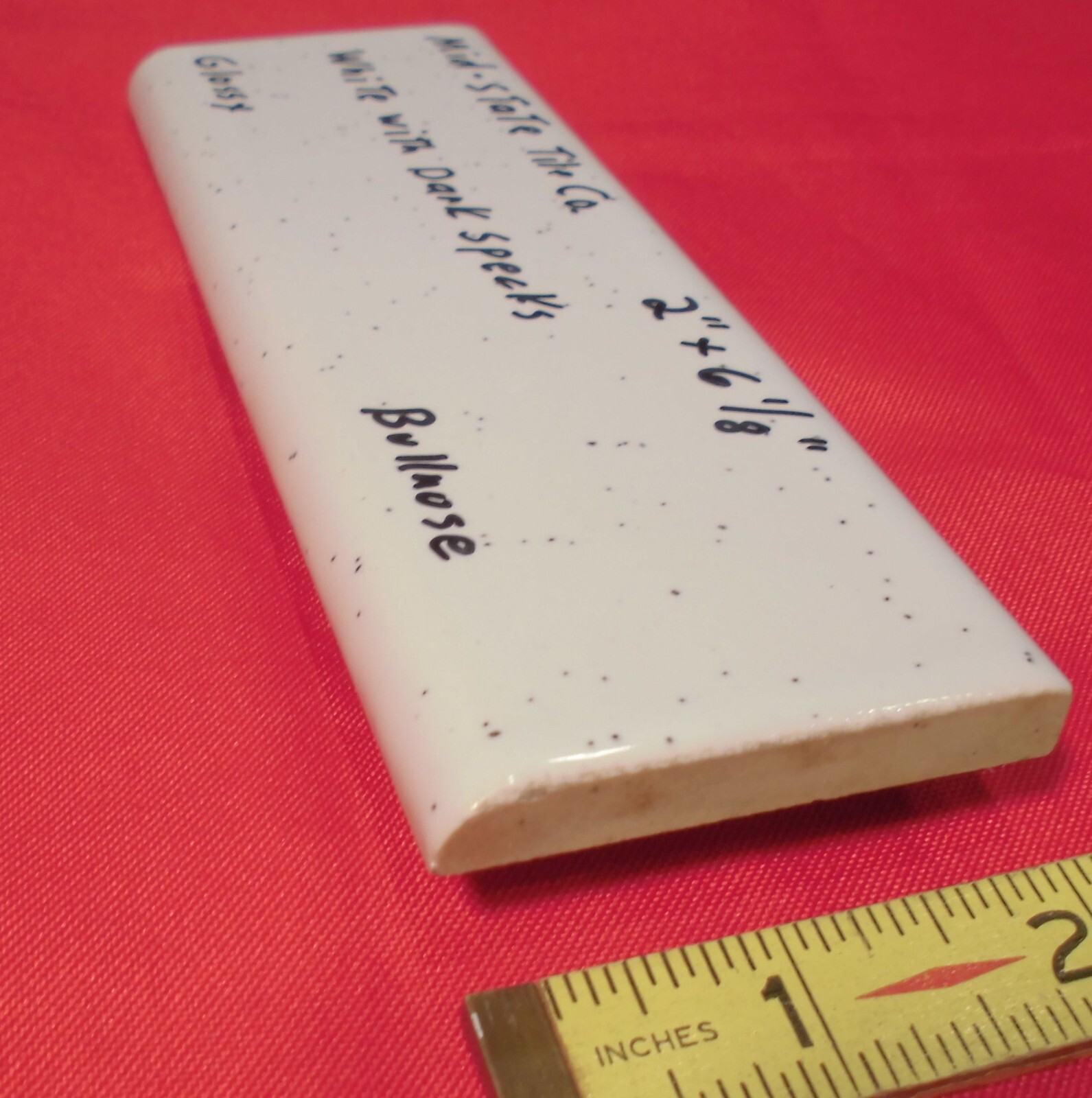 1 pc. White + Dark Specks: 2” X 6” Surface Bullnose Ceramic Tile by MID-STATE