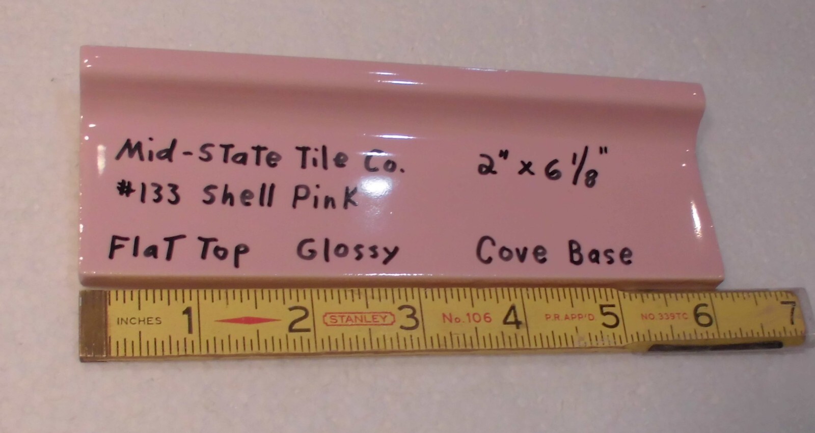 1 pc. Shell Pink 2” X 6-1/8” Glossy Ceramic Cove Base Tile, Flat Top, Mid-State