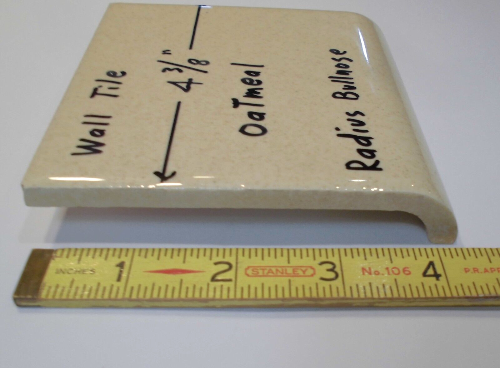1 pc. Oatmeal: Glossy Ceramic Radius Bullnose tile 4-3/8″ Speckled Beige Defects