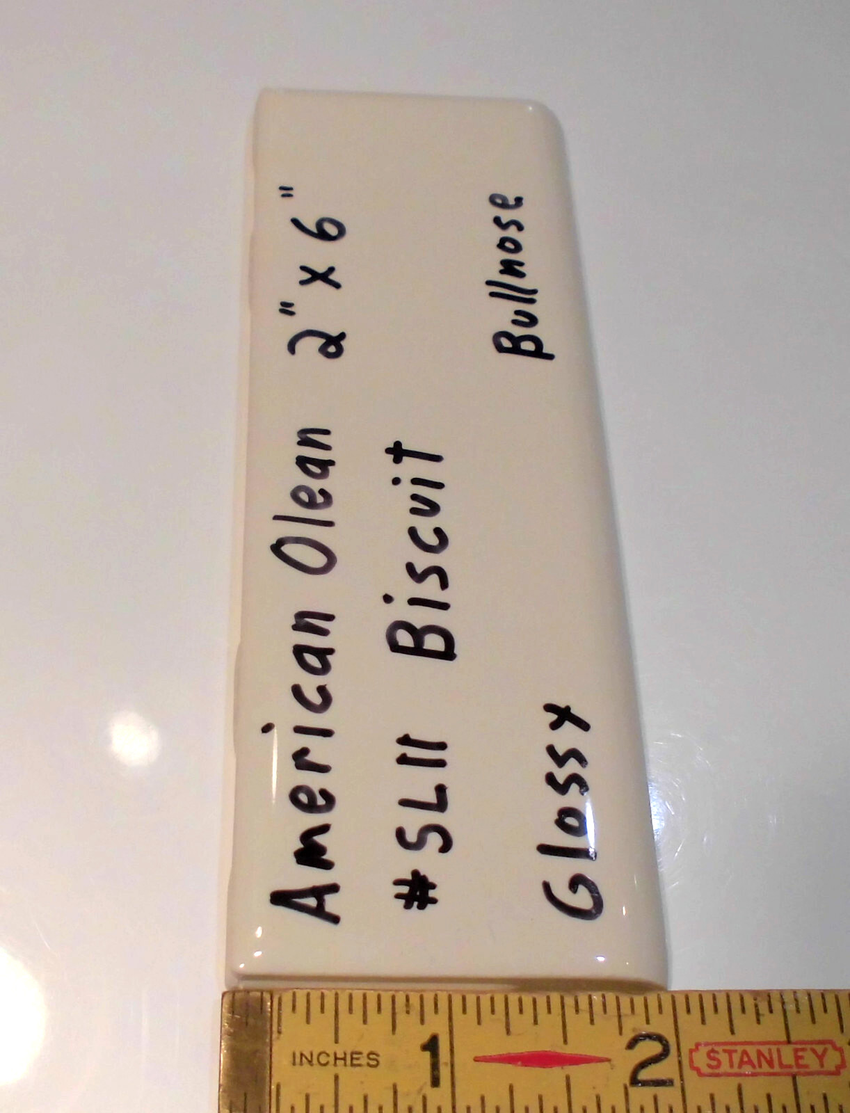 1 pc. Starting Line by American Olean; #SL11 Gloss Biscuit Bullnose Ceramic Tile