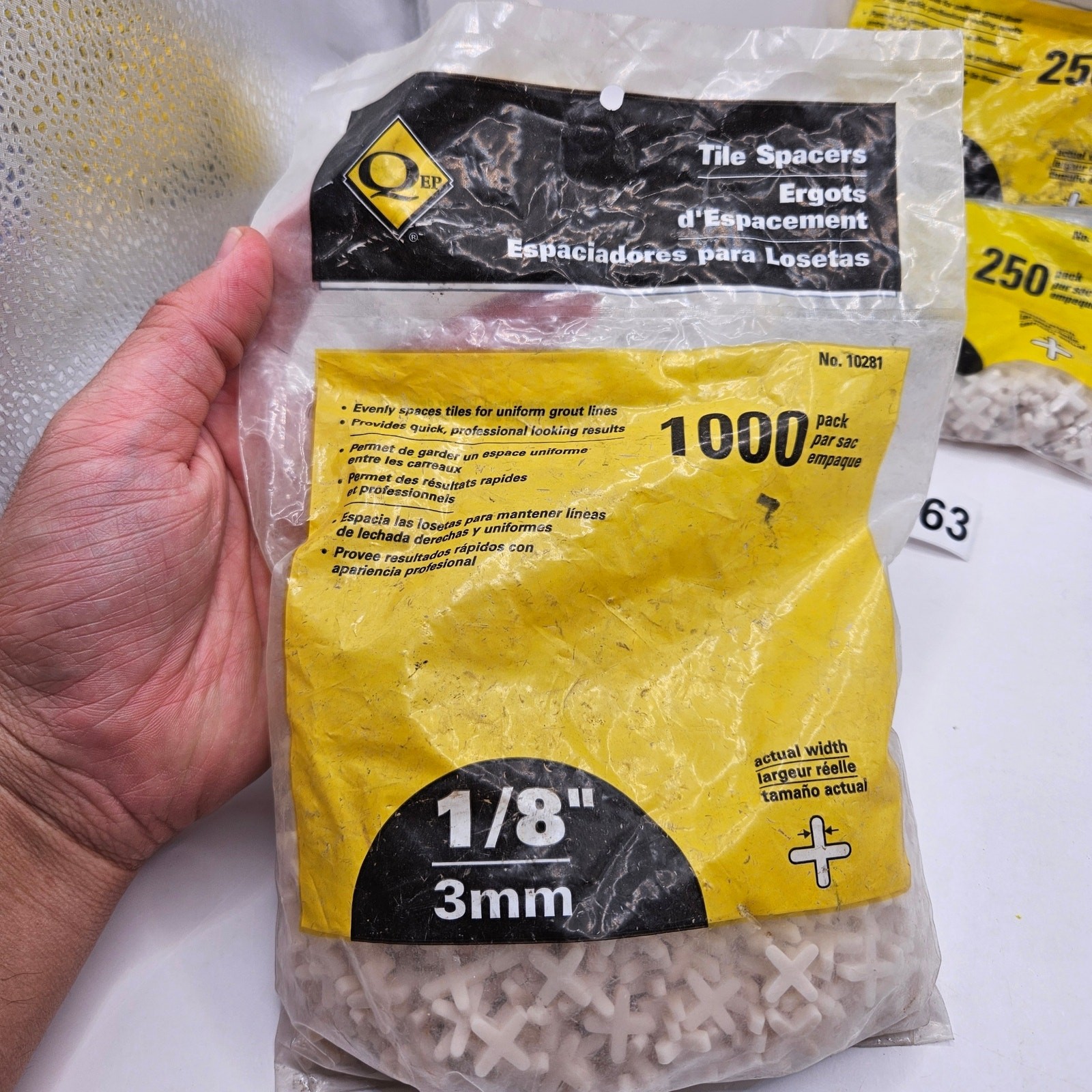 2300 COUNT LOT – QEB 1/8 IN TILE SPACERS NEW WITH 1 OPEN BAG CROSS FLEXIBLE