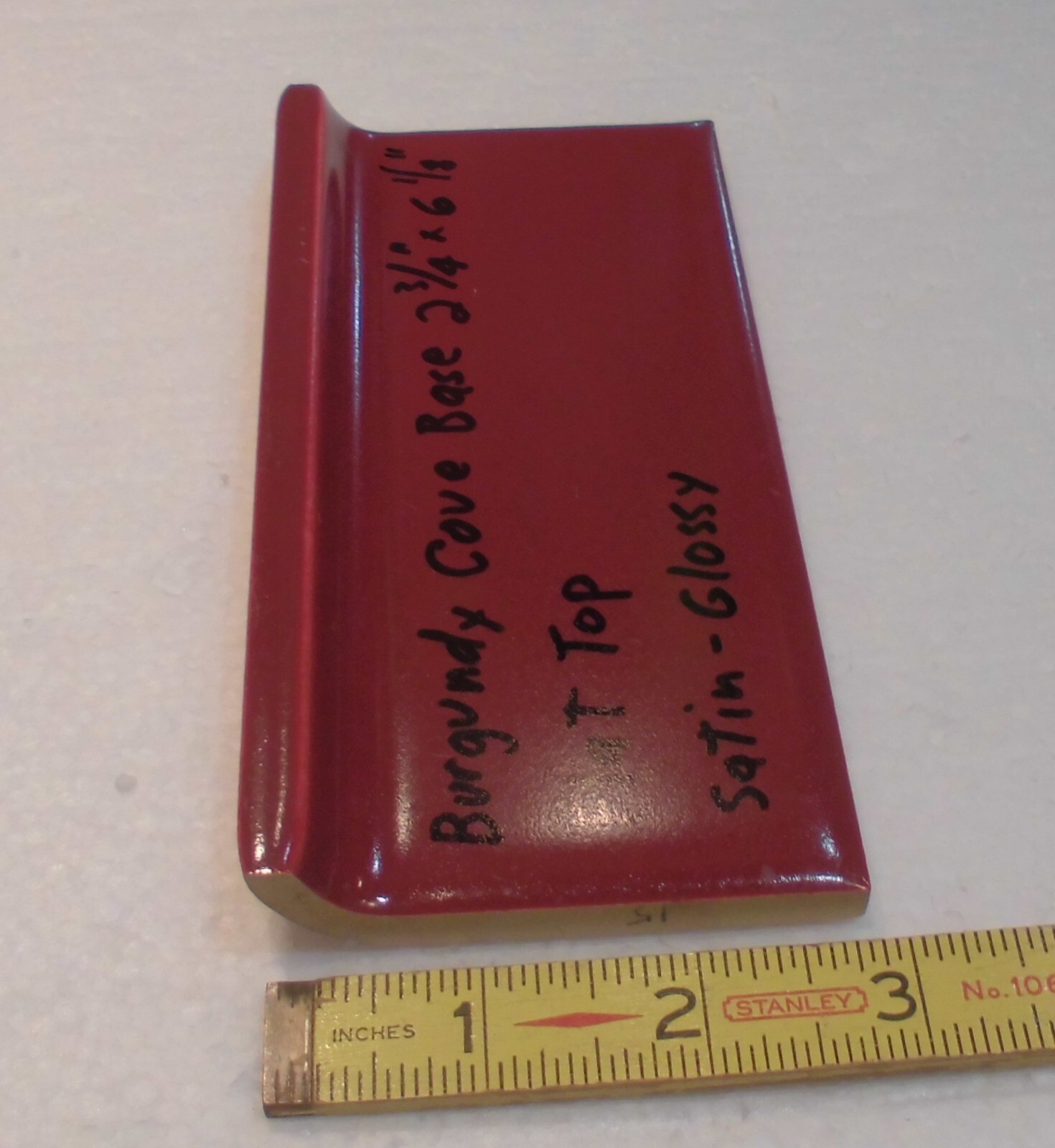 1 pc. Satin Gloss Burgundy: Flat Top base/cove Ceramic Tile: 2-3/4″ X 6-1/8″