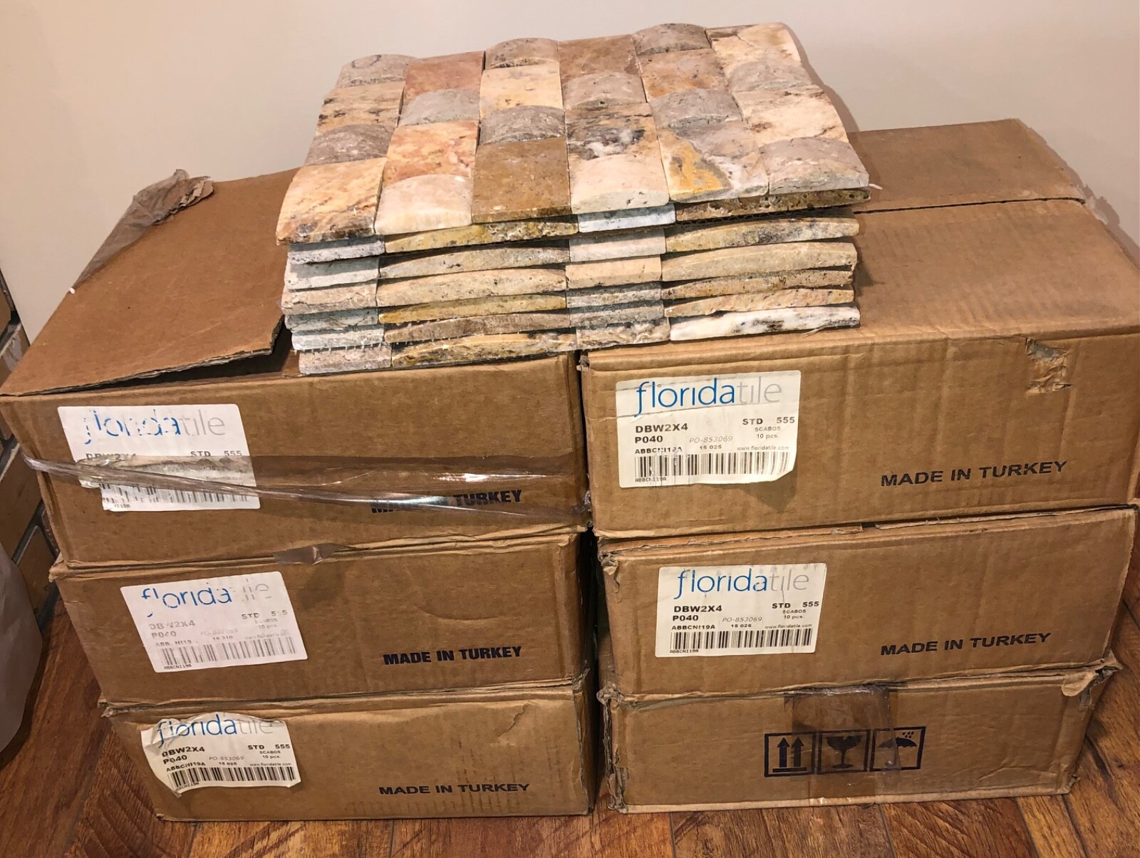 Travertine domed mosaic tile, 12”x 12”x 7/16”, from Florida Tile.