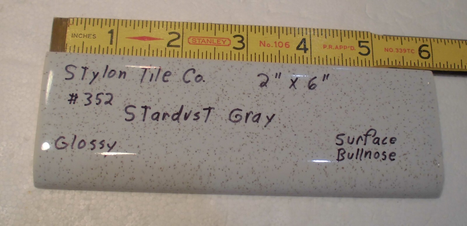 1 pc. Stardust Gray: 2” X 6” Speckled Glossy Bullnose Ceramic Tile, Stylon, Used