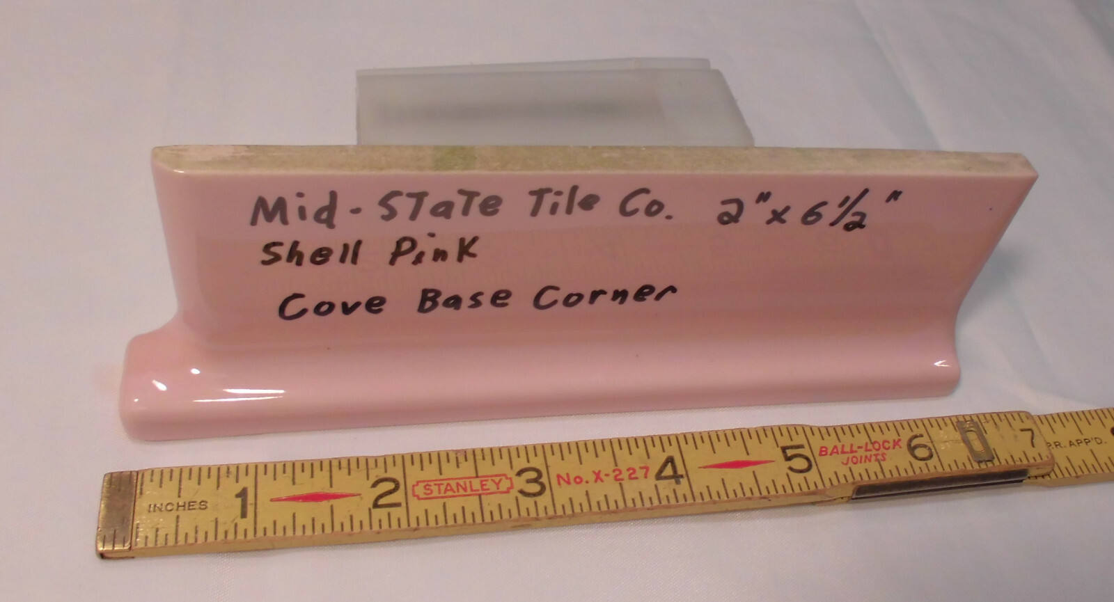 1 pc. Glossy Shell Pink 2” X 6-1/2” Ceramic Cove Base; Flat Tile; Flat Top, L